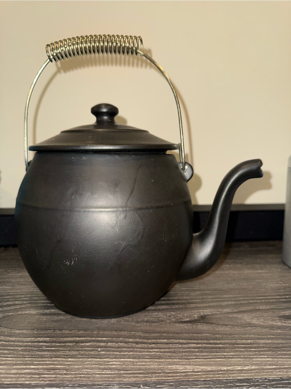 McCoy Pottery Kookie Kettle cookie jar crafted from black ceramic